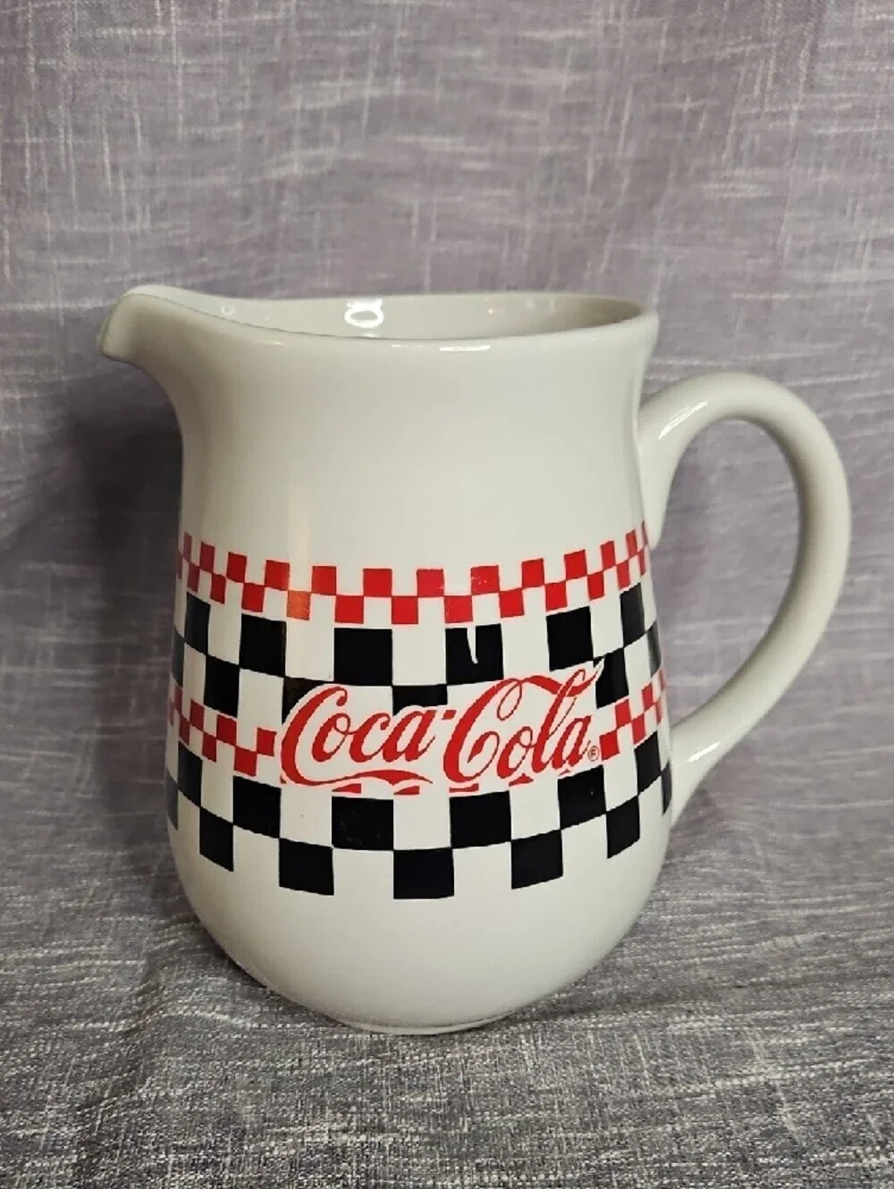 Coca-Cola White Ceramic Pitcher with Red Logo and Black Checkerboard